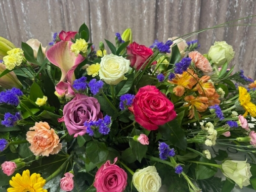 Colourful Garden Casket Spray